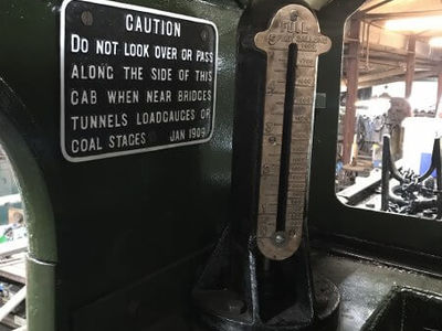 The water level gauge on the tank is reinstated after being removed for many years.